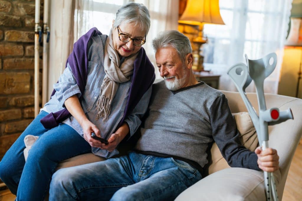 Loving older couple in a nursing home together